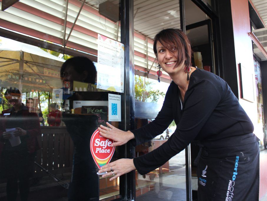 Dragonfly cafe owner Lisa Yacopetti displays the new Safe Place sticker.